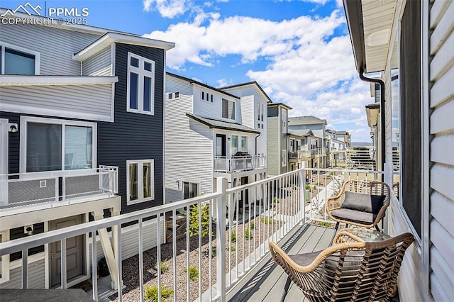 balcony featuring a residential view