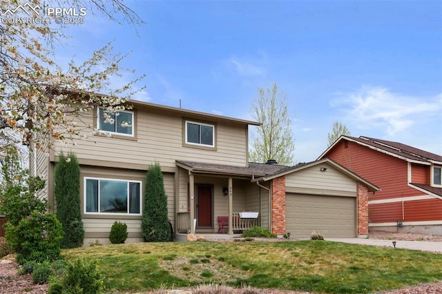 840 Quail Lake Cir, Colorado Springs, CO 80906 - traditional-style home featuring a garage, brick siding, a front lawn, and driveway