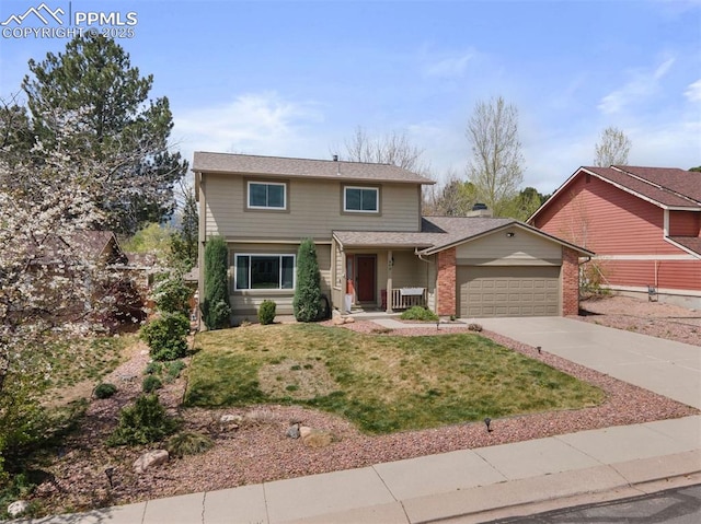 840 Quail Lake Cir, Colorado Springs, CO 80906 - traditional home with a front yard, a garage, a shingled roof, driveway, and brick siding