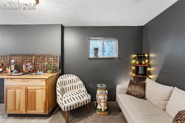 840 Quail Lake Cir, Colorado Springs, CO 80906 - living room featuring wet bar and light colored carpet