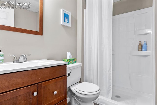 840 Quail Lake Cir, Colorado Springs, CO 80906 - bathroom with toilet, a stall shower, and vanity