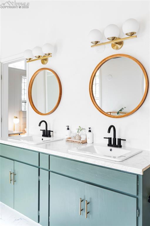 280 Highland Meadows Dr, Florissant, CO 80816 - full bath with a sink and double vanity