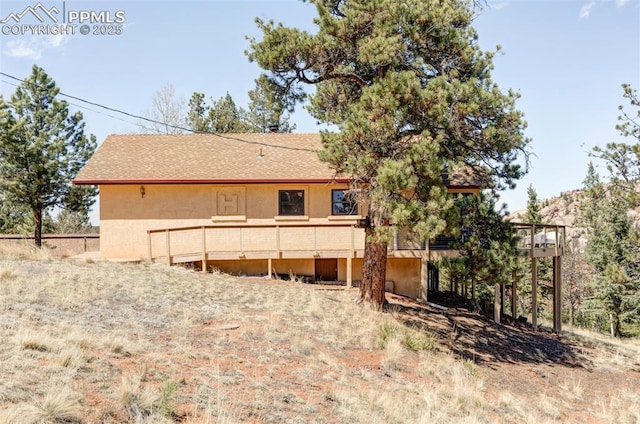 280 Highland Meadows Dr, Florissant, CO 80816 - back of property with stucco siding