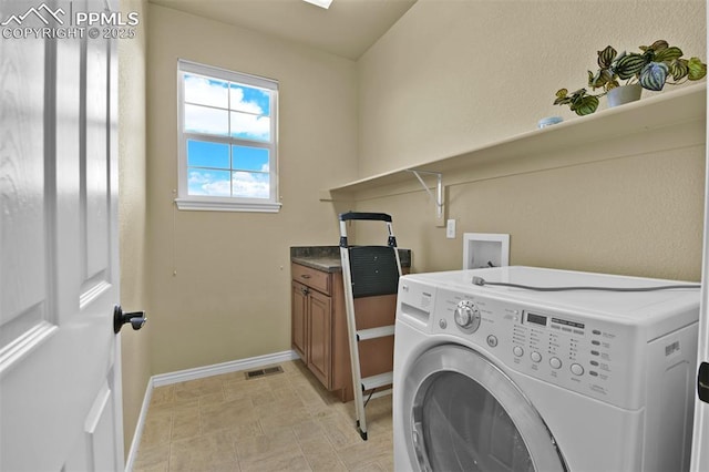 10833 Creede Creek Pt, Colorado Springs, CO 80908 - washroom featuring laundry area, washer / dryer, baseboards, and visible vents