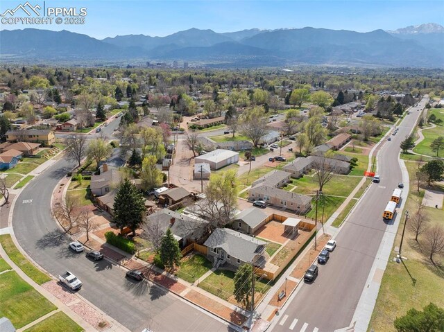 drone / aerial view featuring a mountain view