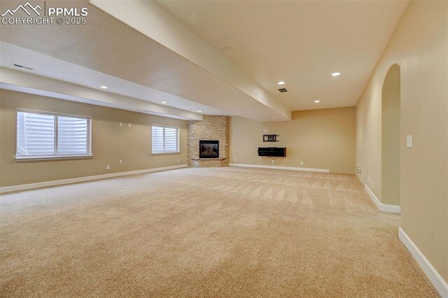 12590 Holmes Rd, Black Forest, CO 80908 - unfurnished living room with a fireplace, baseboards, carpet, and recessed lighting