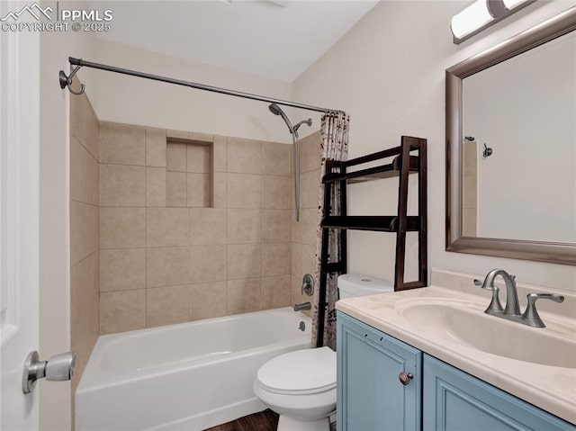 full bathroom featuring toilet, vanity, and shower / bath combination