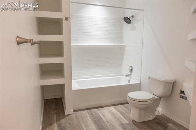 full bathroom featuring shower / bathtub combination, wood finished floors, and toilet