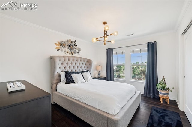 bedroom with crown molding, visible vents, a chandelier, baseboards, and dark wood-type flooring