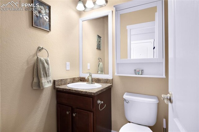 7044 Davey Crocket Ct, Colorado Springs, CO 80922 - bathroom featuring vanity and toilet