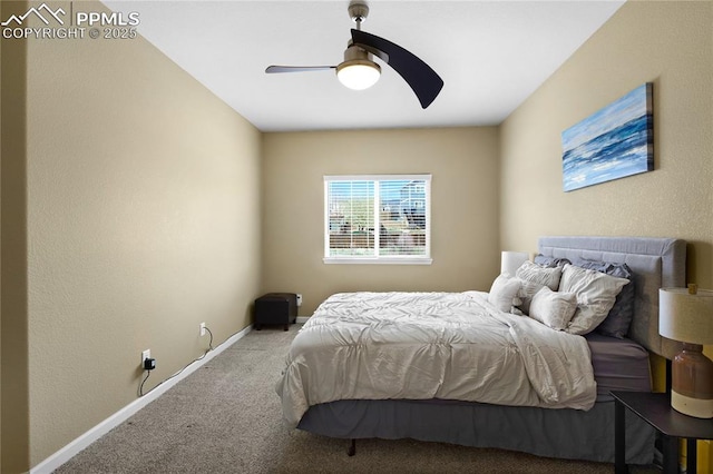 bedroom with carpet floors, baseboards, a ceiling fan, and a textured wall