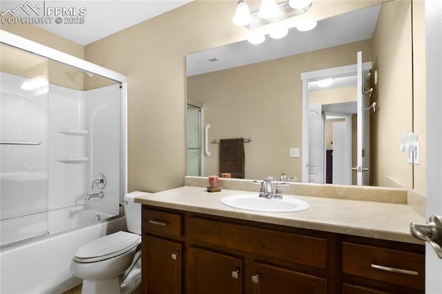 bathroom featuring vanity, enclosed tub / shower combo, and toilet
