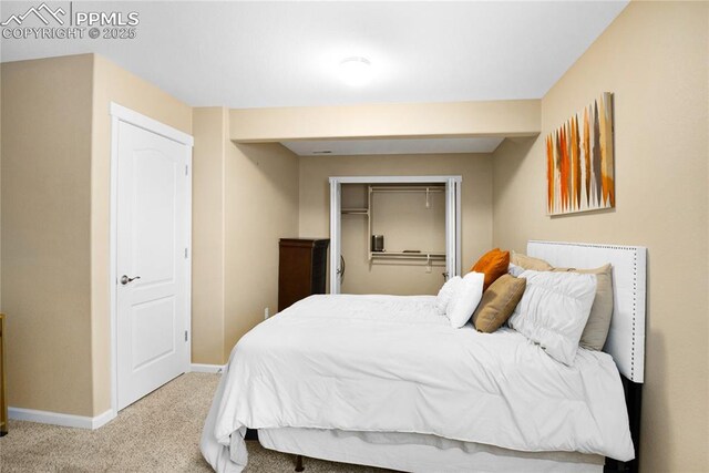 7044 Davey Crocket Ct, Colorado Springs, CO 80922 - carpeted bedroom with baseboards and a closet