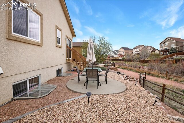 7044 Davey Crocket Ct, Colorado Springs, CO 80922 - view of yard with a residential view, fence, and a patio area