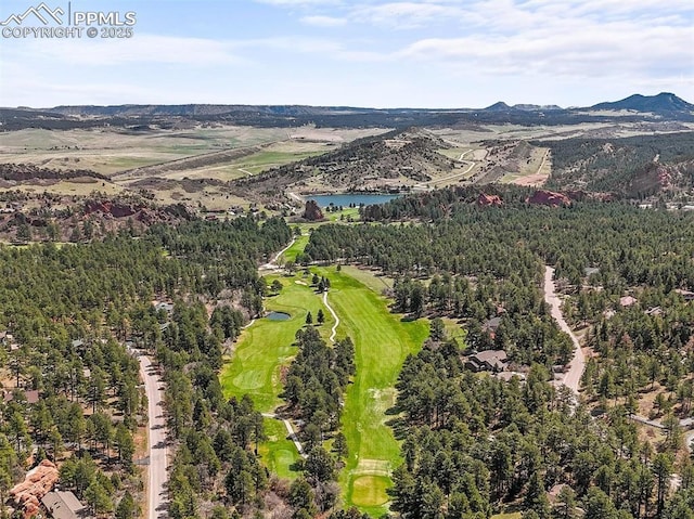 aerial view featuring a water and mountain view and golf course view