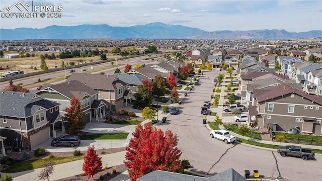 birds eye view of property featuring a residential view and a mountain view