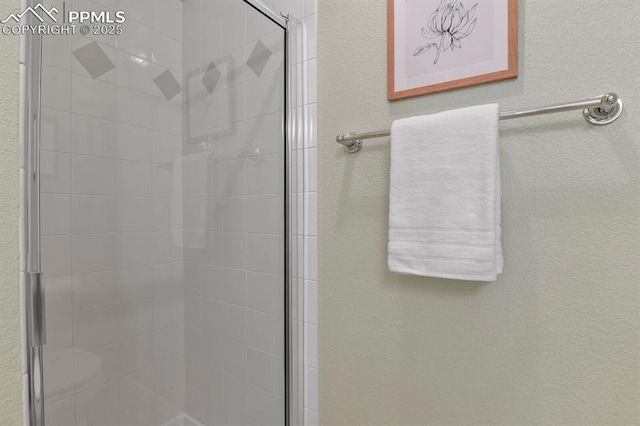 full bathroom with a stall shower