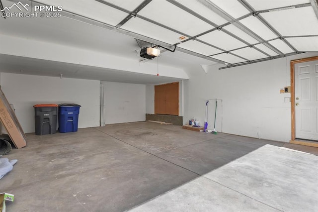 garage featuring a garage door opener