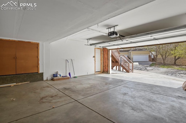 garage featuring a garage door opener