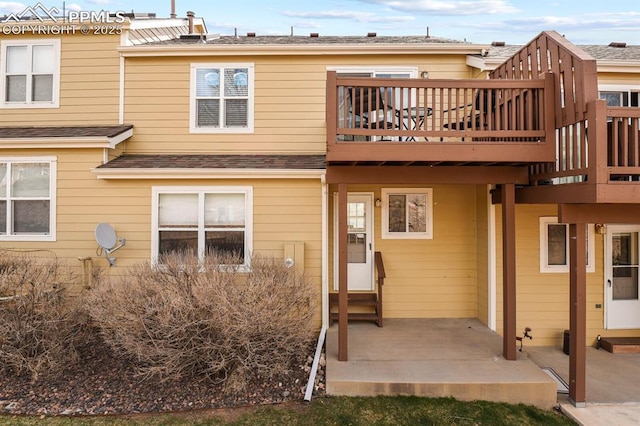 back of property featuring a patio area