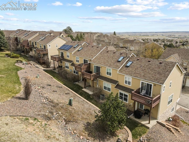 drone / aerial view with a residential view