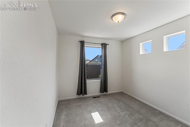 6117 Ashmore Ln, Colorado Springs, CO 80927 - carpeted spare room featuring baseboards and visible vents