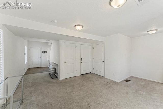 6117 Ashmore Ln, Colorado Springs, CO 80927 - interior space featuring visible vents, carpet flooring, and baseboards