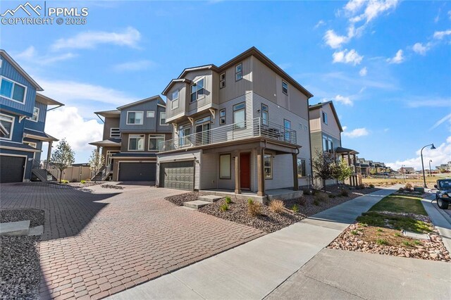 6117 Ashmore Ln, Colorado Springs, CO 80927 - view of front facade with a residential view, driveway, and an attached garage