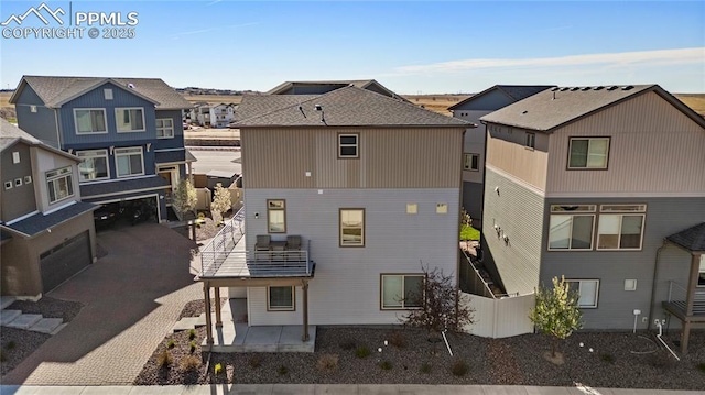6117 Ashmore Ln, Colorado Springs, CO 80927 - rear view of property featuring a residential view, a patio area, and fence