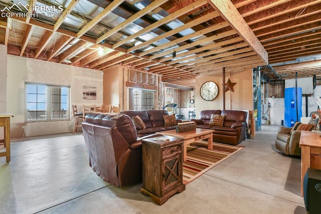 living room featuring finished concrete flooring