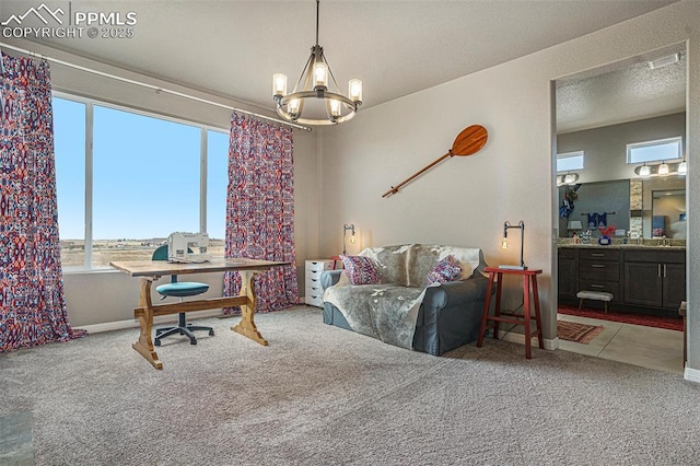 12857 Morning Breeze Way, Peyton, CO 80831 - interior space featuring an inviting chandelier and baseboards