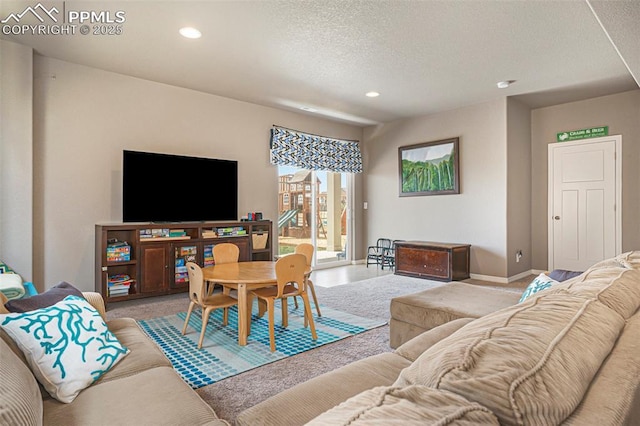 12857 Morning Breeze Way, Peyton, CO 80831 - carpeted living room with recessed lighting, baseboards, and a textured ceiling