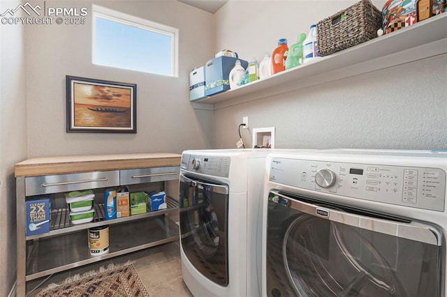 12857 Morning Breeze Way, Peyton, CO 80831 - clothes washing area with tile patterned flooring, laundry area, and washer and dryer