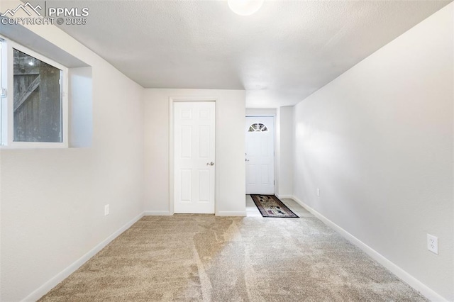 735 N Walnut St, Colorado Springs, CO 80905 - additional living space with baseboards and carpet