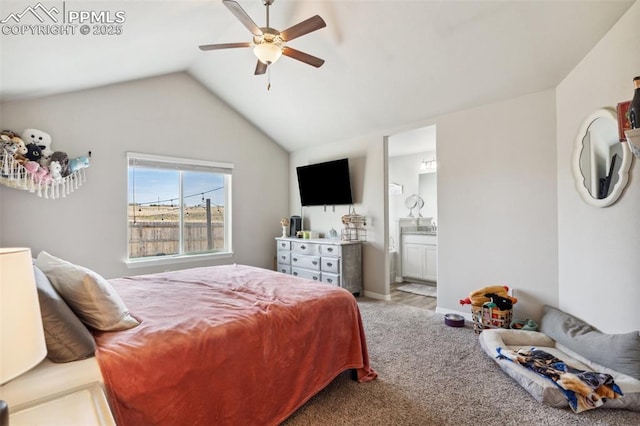 bedroom featuring carpet, a ceiling fan, lofted ceiling, and ensuite bathroom