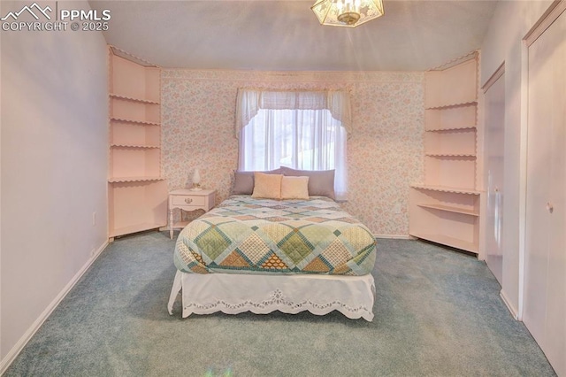 bedroom featuring carpet floors, wallpapered walls, and baseboards