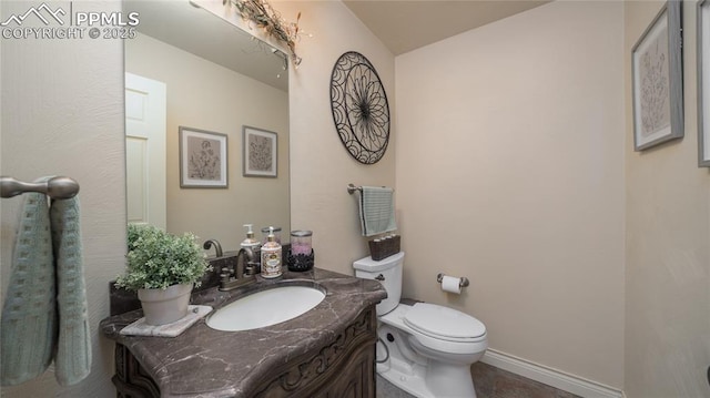 17770 Radbourne Ct, Monument, CO 80132 - half bath with vanity, toilet, and baseboards