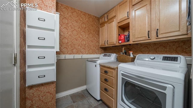 17770 Radbourne Ct, Monument, CO 80132 - laundry area with wallpapered walls, cabinet space, independent washer and dryer, and baseboards