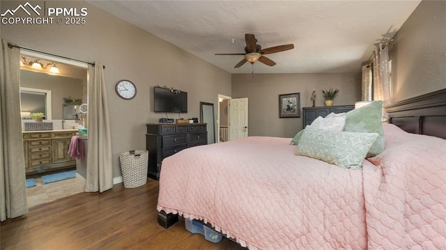 17770 Radbourne Ct, Monument, CO 80132 - bedroom featuring dark wood-type flooring, ensuite bath, and ceiling fan