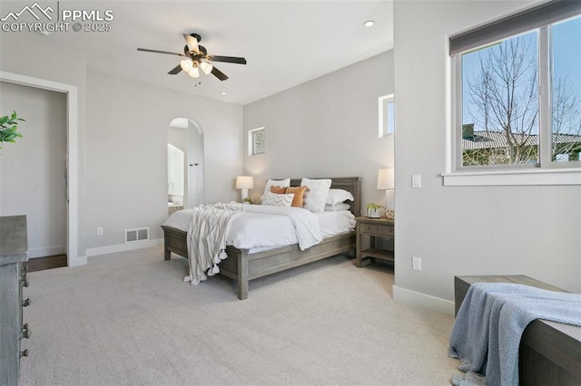 13625 Kitty Joe Ct, Colorado Springs, CO 80921 - bedroom with arched walkways, visible vents, baseboards, recessed lighting, and carpet floors