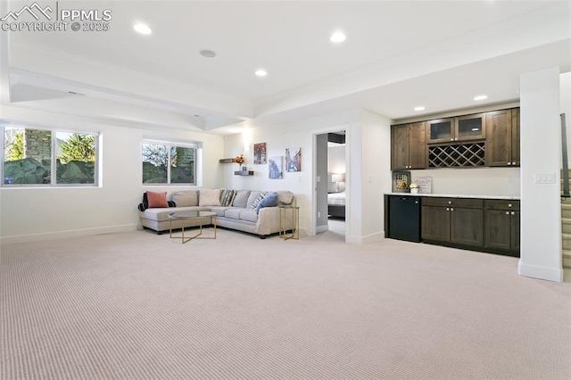 13625 Kitty Joe Ct, Colorado Springs, CO 80921 - living room with indoor bar, light carpet, baseboards, and recessed lighting