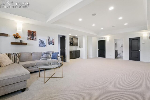 13625 Kitty Joe Ct, Colorado Springs, CO 80921 - living room with light carpet, a tray ceiling, visible vents, recessed lighting, and beamed ceiling