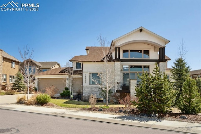 13625 Kitty Joe Ct, Colorado Springs, CO 80921 - view of front of home with stone siding and stucco siding