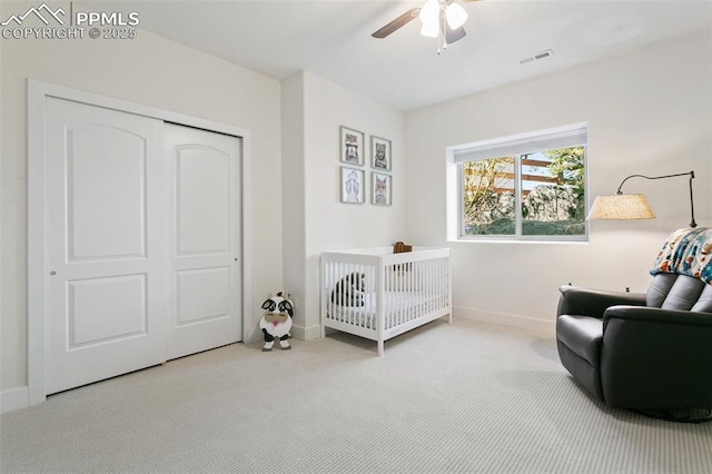 13625 Kitty Joe Ct, Colorado Springs, CO 80921 - bedroom with a closet, a crib, carpet, baseboards, and visible vents