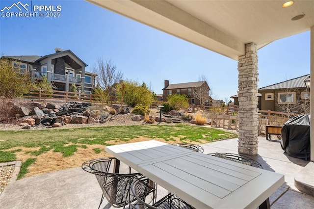 13625 Kitty Joe Ct, Colorado Springs, CO 80921 - view of patio with outdoor dining area and a grill