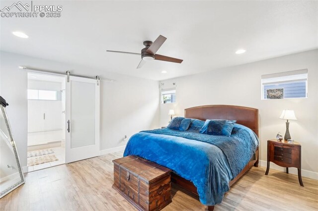 bedroom with recessed lighting, baseboards, and wood finished floors