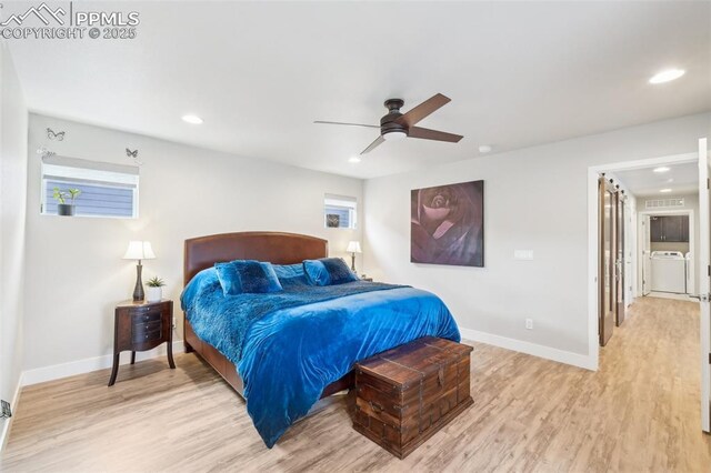 bedroom featuring baseboards, recessed lighting, light wood finished floors, and washer / clothes dryer