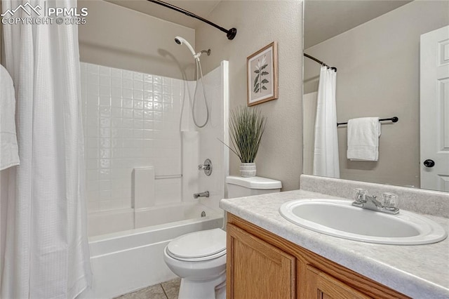 full bath with vanity, tile patterned floors, shower / bath combination with curtain, and toilet