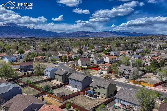 bird's eye view with a residential view and a mountain view