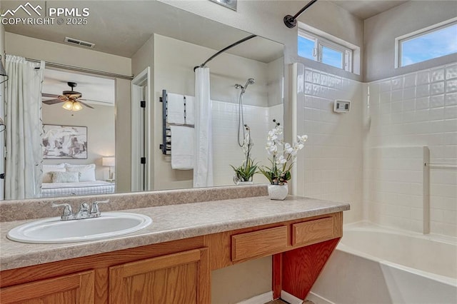 ensuite bathroom with ceiling fan, visible vents, shower / tub combo, vanity, and ensuite bathroom